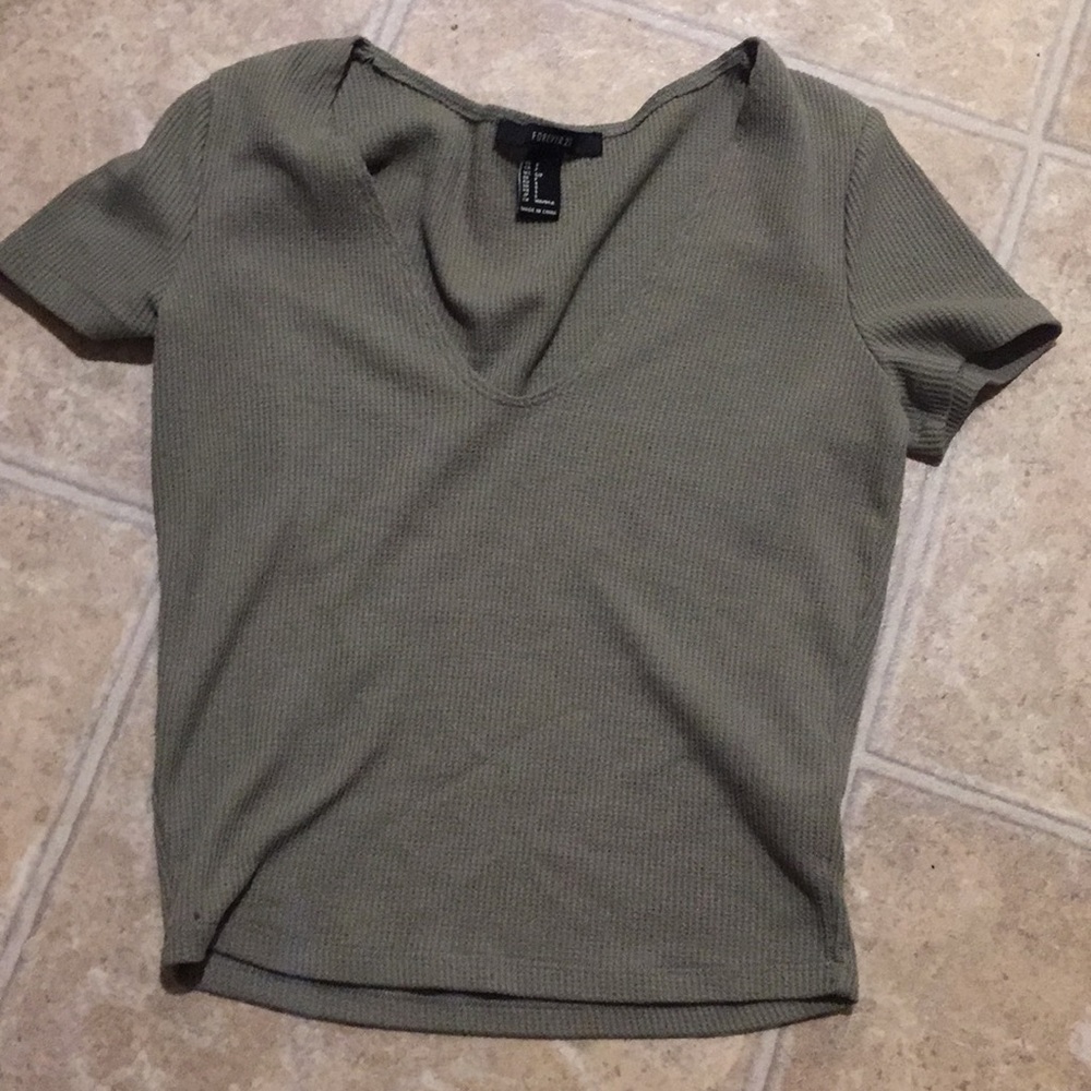 Green v neck shirt